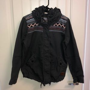 Grey zip-up jacket with pastel tribal design